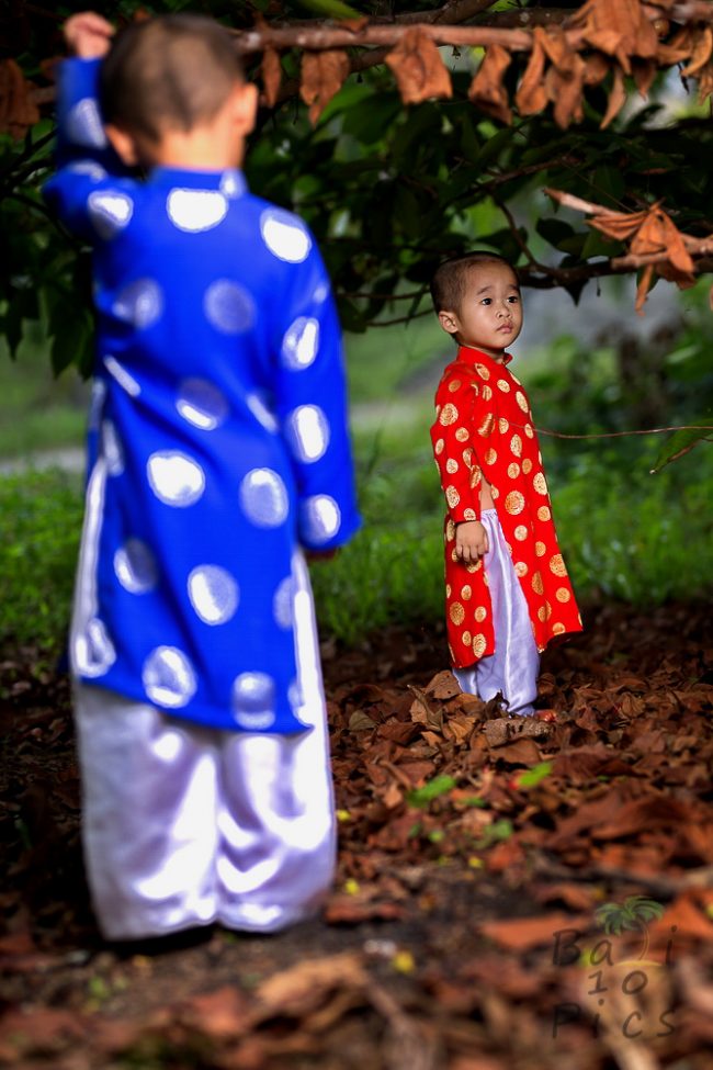 Brothers with traditional clothes Ao Dai - Vietnam