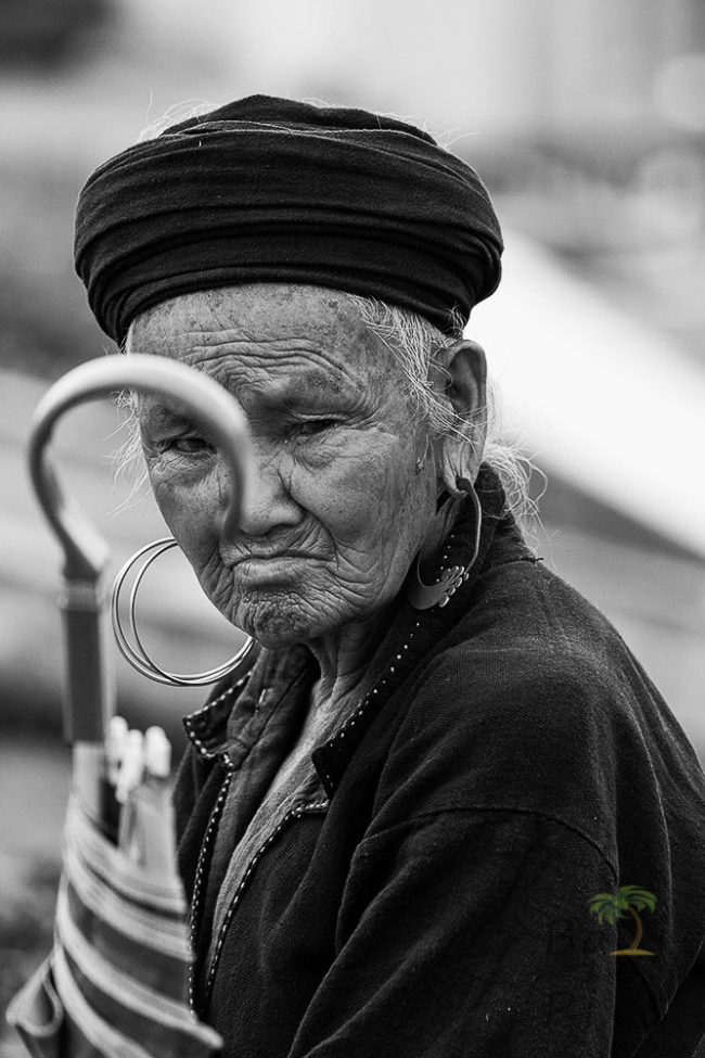 Old woman and umbrella