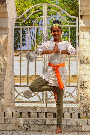 Woman in front of the Uluwatu Temple - Bali